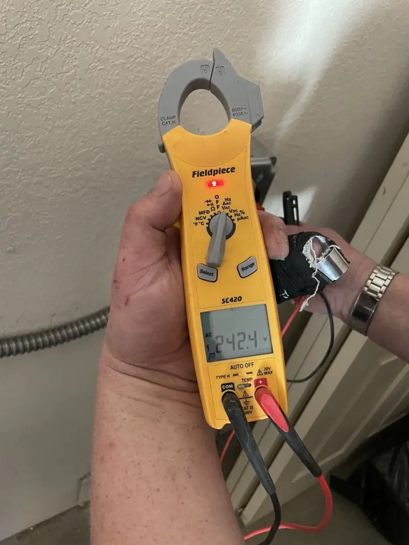 Voltage testing with clamp meter during Electrical Installation Services in South San Gabriel